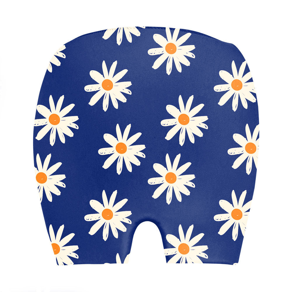 Blue daisy-print baby bloomers with white flowers and orange centers, soft fabric for infants