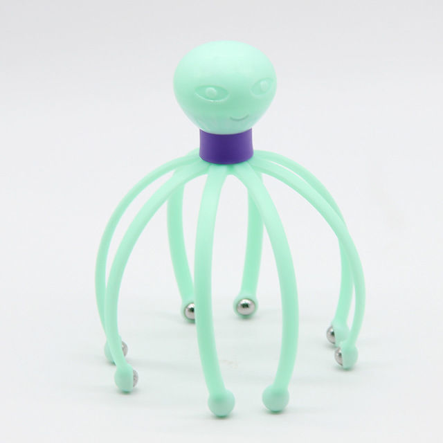 Mint green octopus-shaped scalp massager with rolling beads for relaxation and stress relief