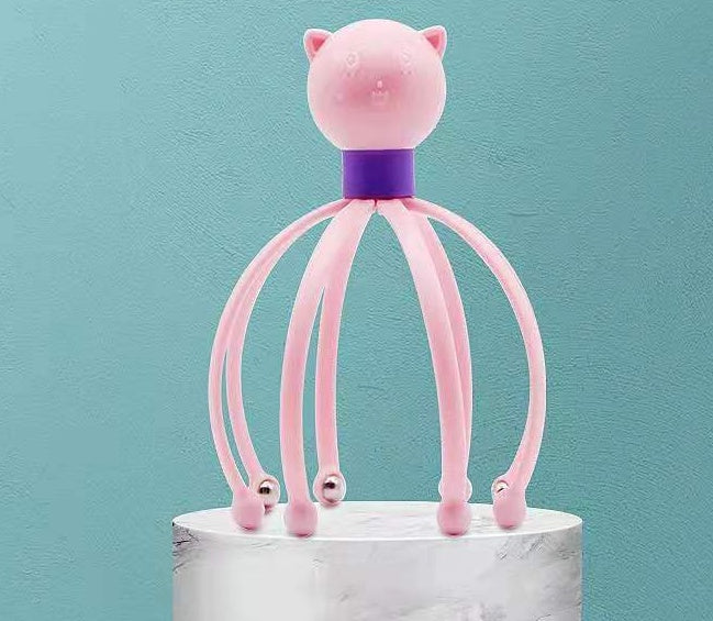 Pink cat-head scalp massager with flexible silicone tentacles for relaxation and stress relief